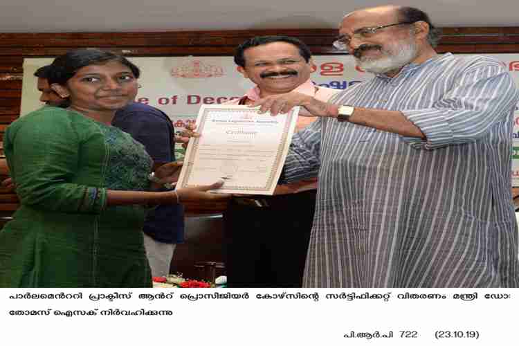 certificate distributrion by Minister Dr. Thomas Isaac at Parliamentary practice and procedure course