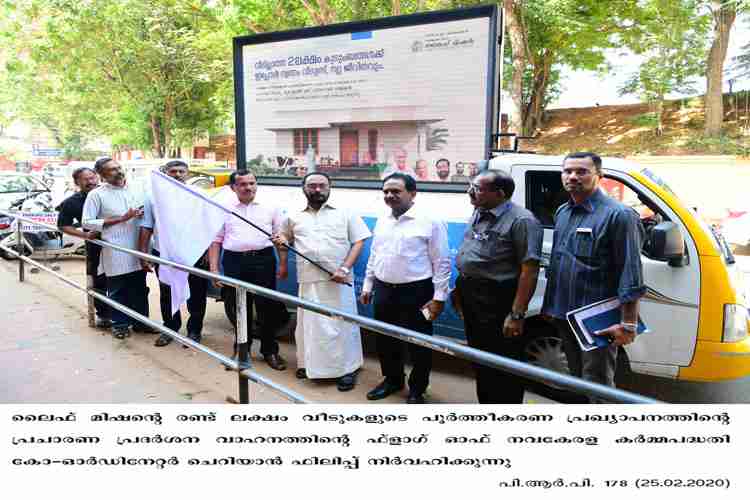 Cherian Philip flags off life mission promotion exhibition vehicle