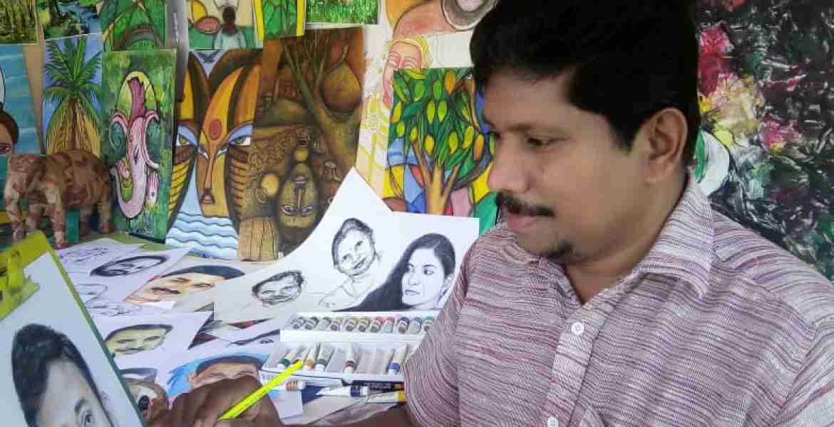 ചിത്രരചനയില്‍ ഏര്‍പ്പെട്ടിരിക്കുന്ന രാജീവ് ചെല്ലാനം