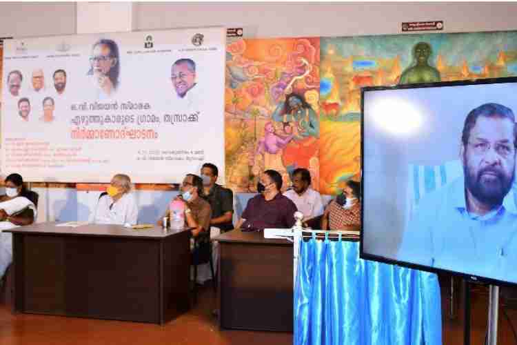 ഒ.വി വിജയൻ സ്മാരകം എഴുത്തുകാരുടെ ഗ്രാമം നിർമ്മാണോദ്ഘാടനം മന്ത്രി കടകംപള്ളി സുരേന്ദ്രൻ ഓൺലൈനായി നിർവഹിക്കുന്നു