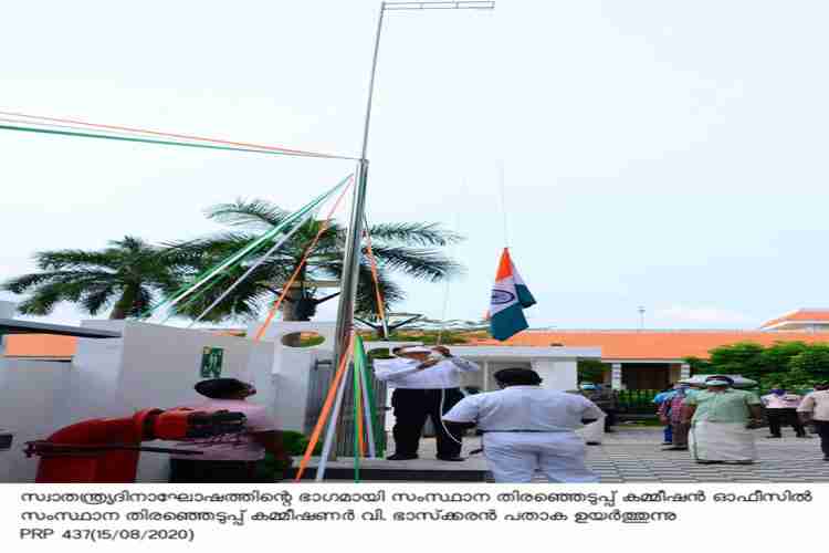 State Election Commissioner V. Bhaskaran hoists flag as part of independance day celebrations