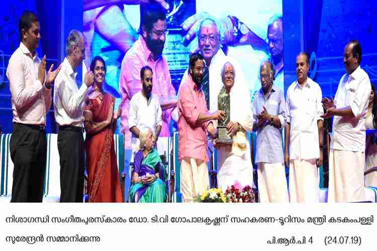 Minister Kadakampally Surendran presents Nishagandhi puraskaram to Dr. TV Gopalakrishnan